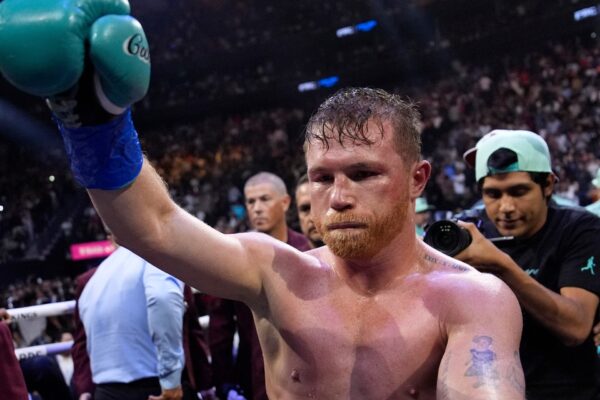 Canelo Alvarez retains boxing titles with unanimous victory over Munguia