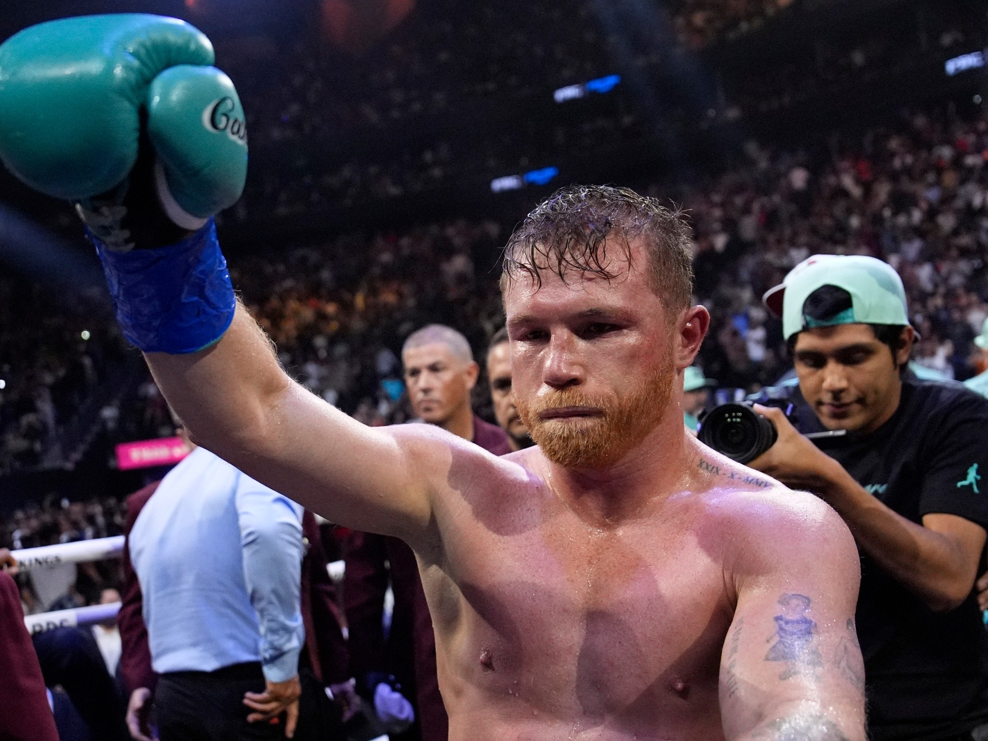 Canelo Alvarez retains boxing titles with unanimous victory over Munguia