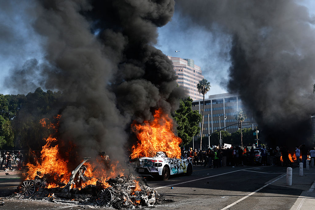 Waymo robotaxis, Lime e-scooters set ablaze during LA protests